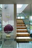Volledig glazen balustrade met rvs handregel