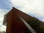Gevelbekleding met geperforeerde Corten staalplaten.