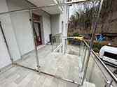 Glazen scheidingswand met RVS frame