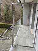 Glazen scheidingswand met RVS frame