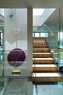 Volledig glazen balustrade met rvs handregel
